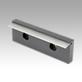 Hold-down jaw pads with spring blade for NC vice